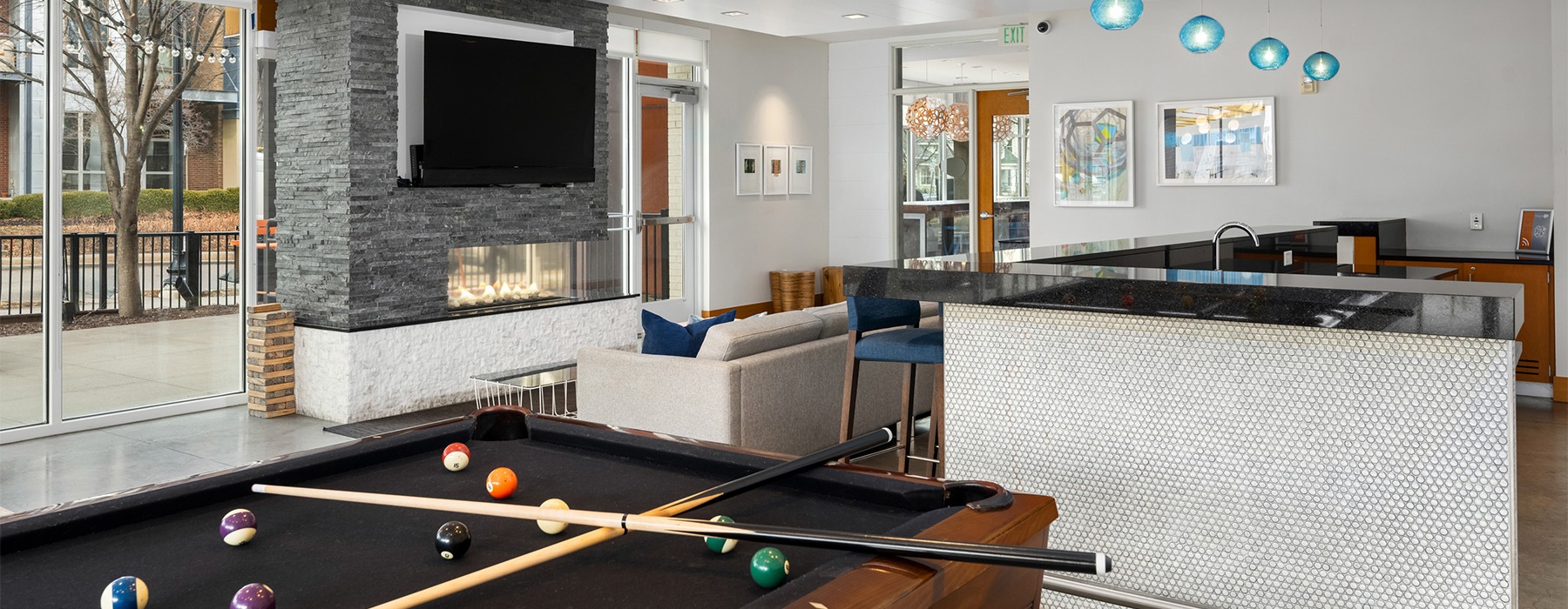 Clubroom with billiards, lounge seating, and Tvs